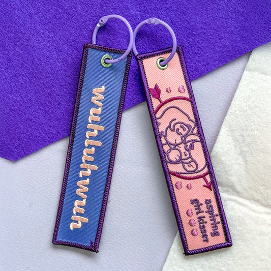 wuhluhwuh Girl Kisser Embroidered Flight Tag